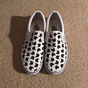 black cat slip on vans